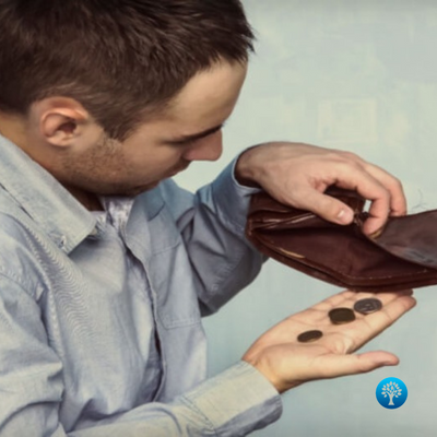 man-looking-in-wallet-for-money